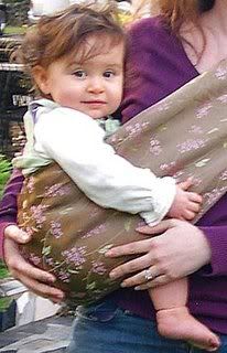 Baby in Mamma's Milk Pouch Carrier