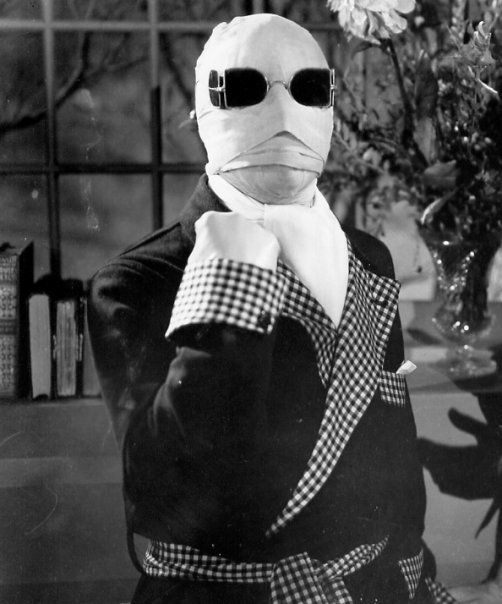 The Invisible Man, wearing his face-covering bandages and sunglasses.
