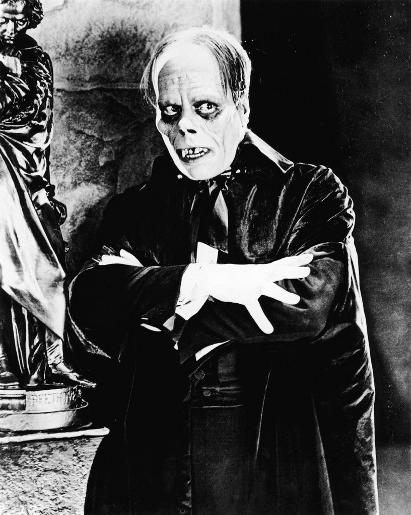 Lon Chaney as the Phantom in The Phantom of the Opera, looking terrifying.