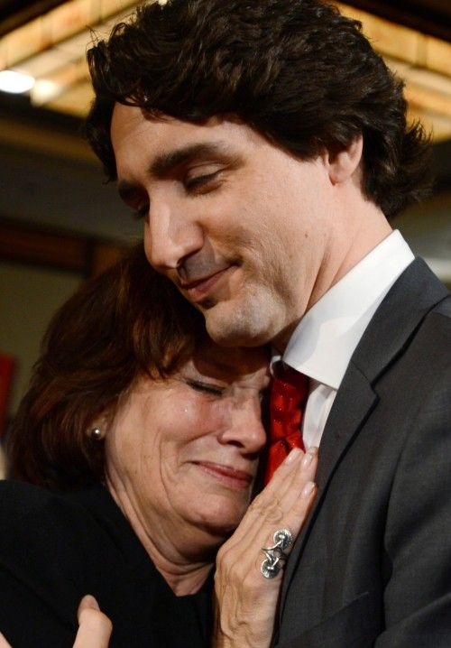  photo Justin hugs his mother Margaret