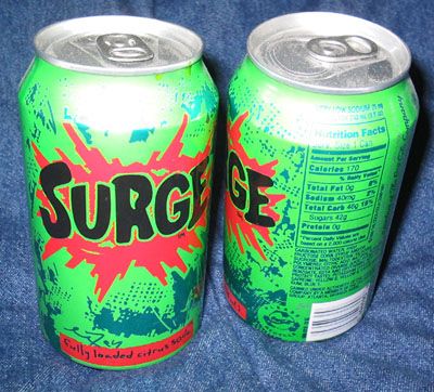Cans of Surge citrus soda.