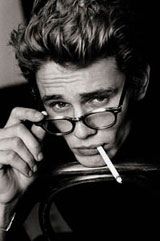 Black and white Photo of James Franco as James Dean, but with glasses