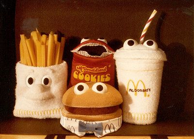 McDonaldland Happy Meal characters, a shake, a burger, cookies and french fries.  They're puppets!