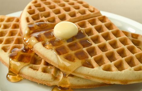 Waffles with butter and syrup