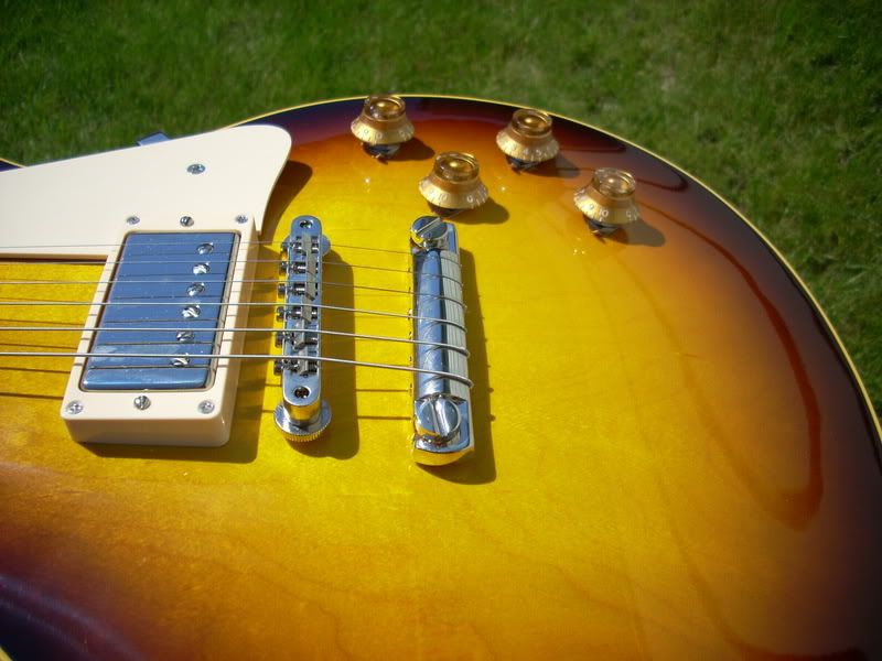 Wrapping strings around the tailpiece? My Les Paul Forum