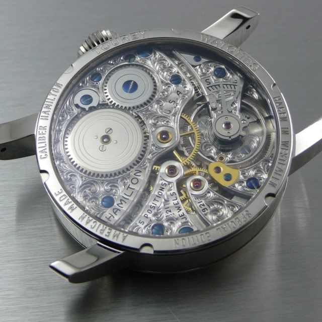http://i163.photobucket.com/albums/t320/tourbillon1801/TOURBY%20HAMILTON/921%20hand%20engraved%20rhodium/SkeletonDial031.jpg