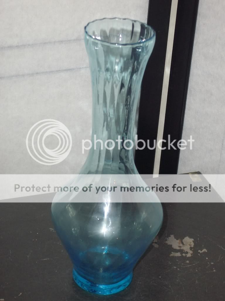   vase in excellent condition standing 10 ½ inches tall and 2 ½ inches